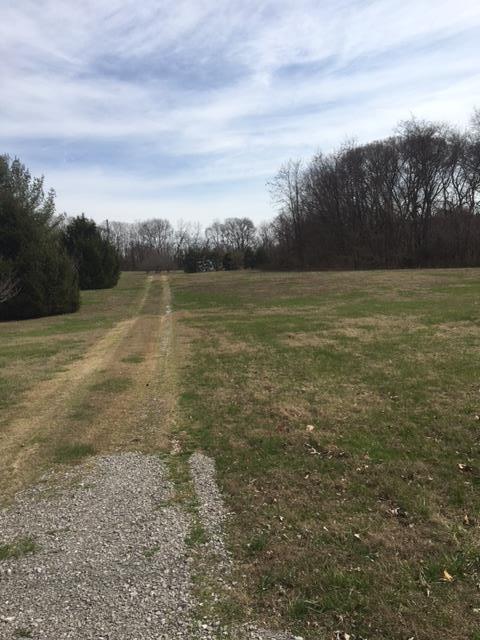 0 Clara Mathis Road Spring Hill, TN 37174 - Photo 1 of 4 a view of an ocean beach and mountain