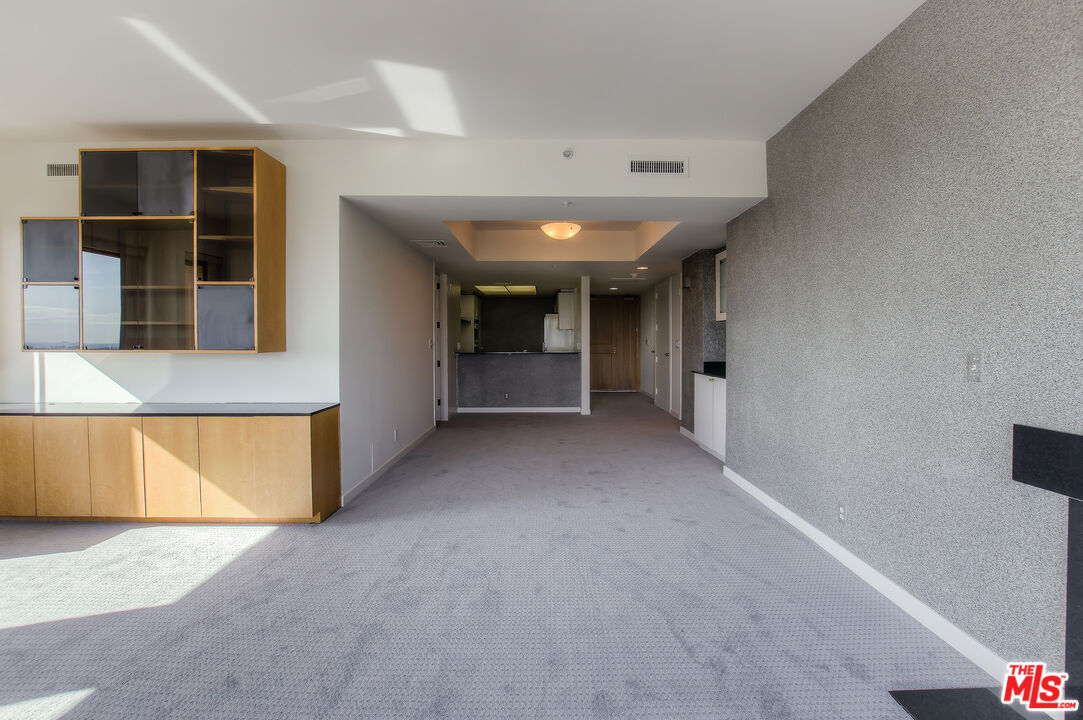 10520 Wilshire Boulevard, Unit 905 Los Angeles, CA 90024 - Photo 8 of 17 a view of an empty room with a window