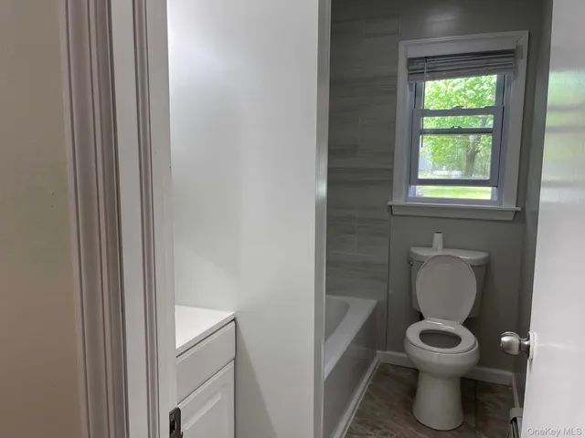 a bathroom with a toilet