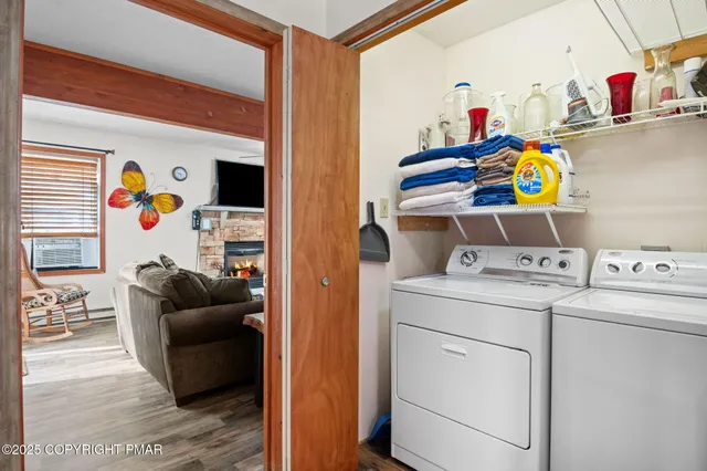 a utility room with dryer and washer