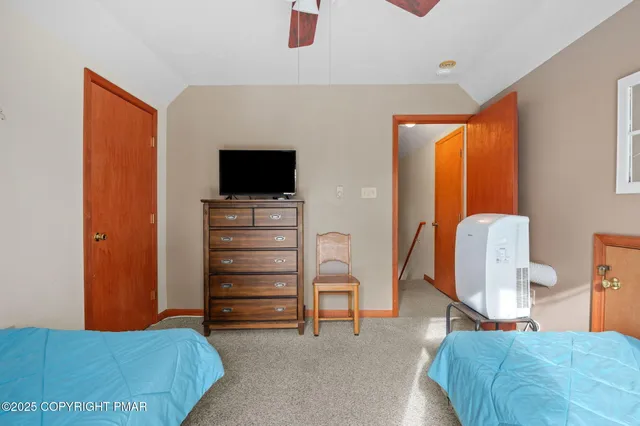 a bedroom with a bed and furniture