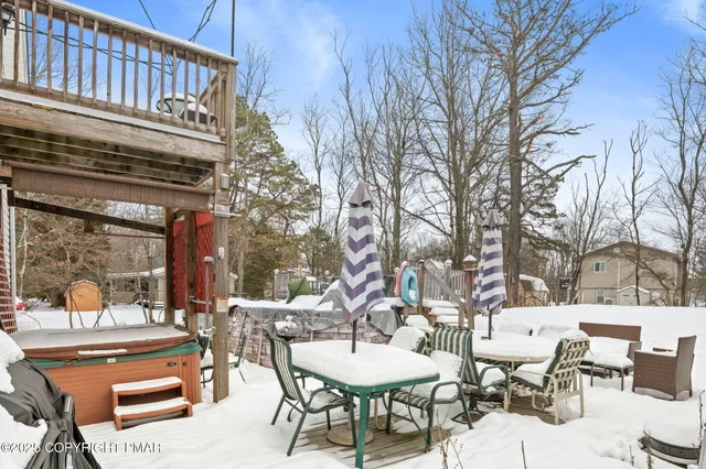 a view of a patio with a yard
