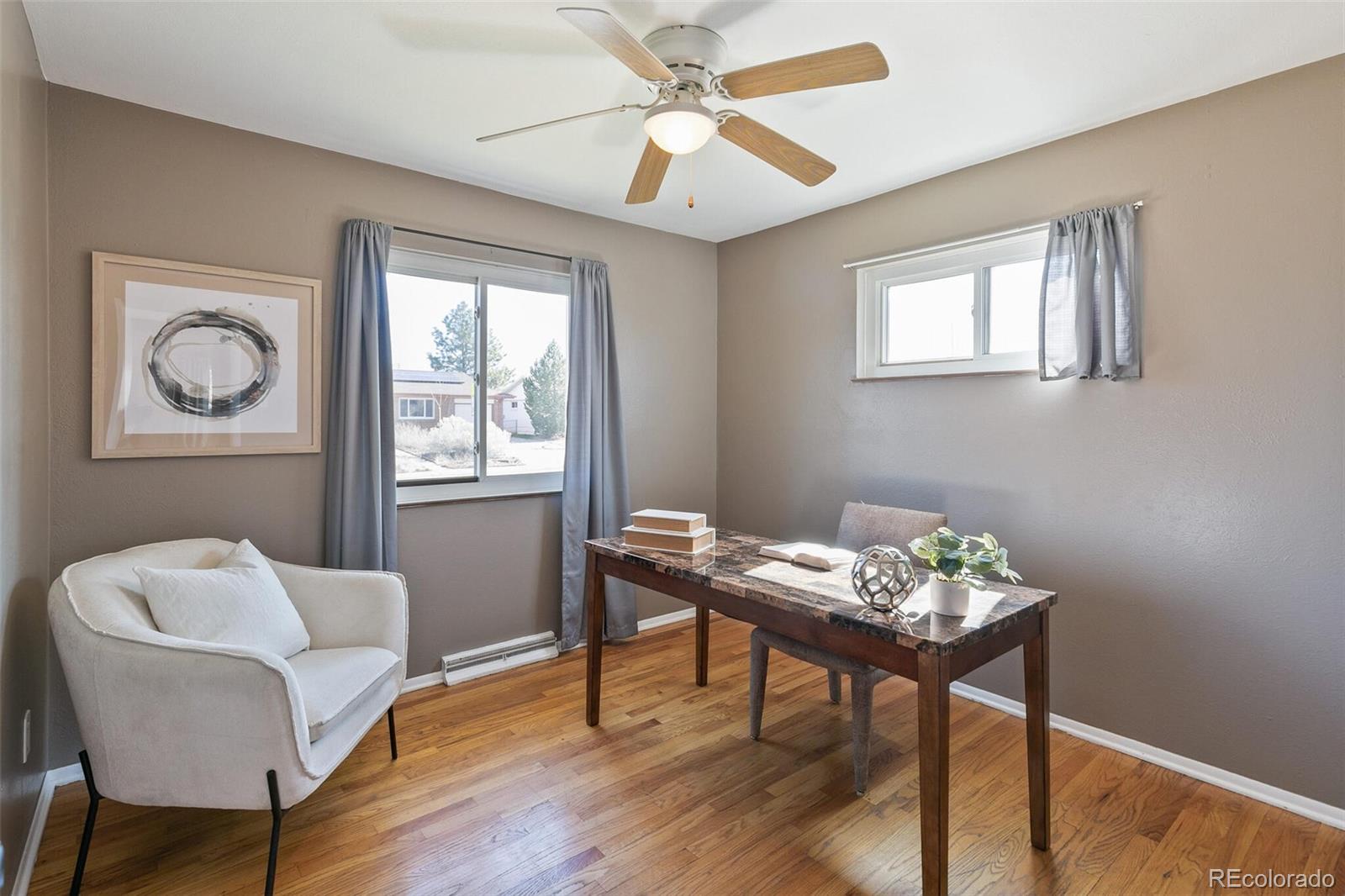 5500 Vale Drive Denver, CO 80246 - Photo 21 of 40 a workspace with furniture and a window