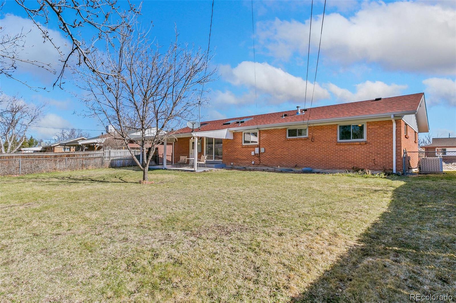 5500 Vale Drive Denver, CO 80246 - Photo 34 of 40 a front view of house with yard