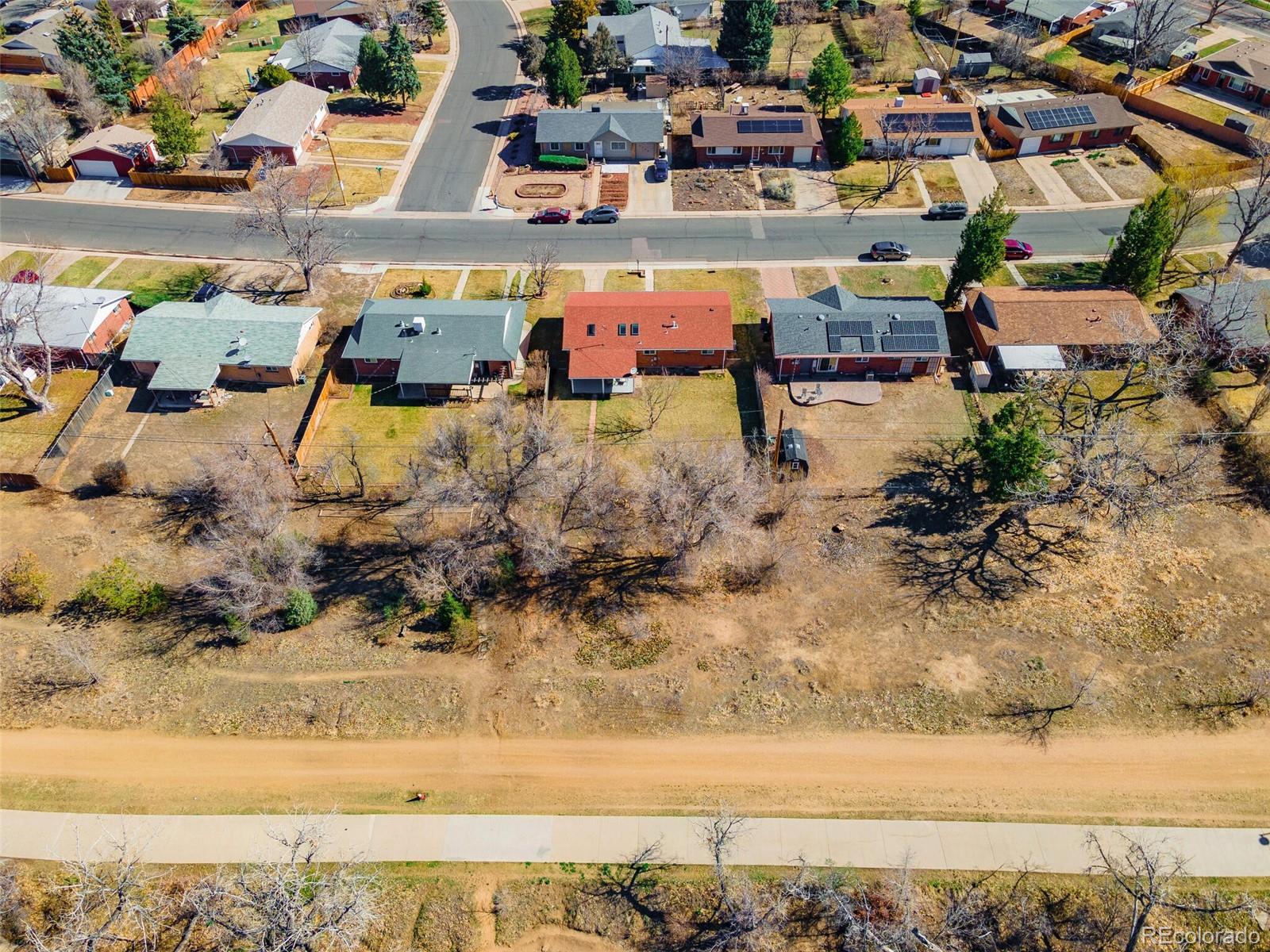5500 Vale Drive Denver, CO 80246 - Photo 38 of 40 a view of swimming pool with a yard and lake view