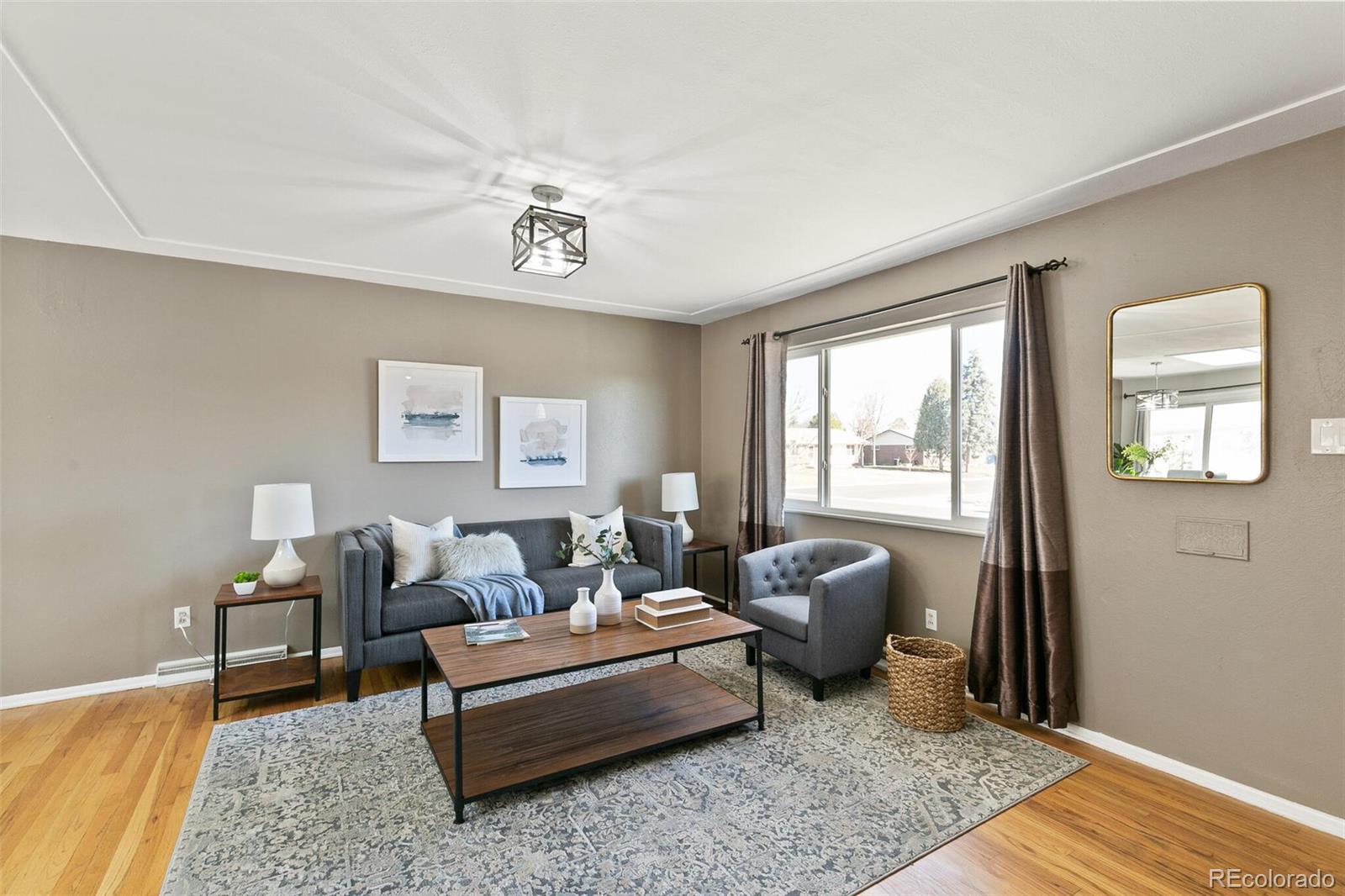 5500 Vale Drive Denver, CO 80246 - Photo 9 of 40 a living room with furniture and a window