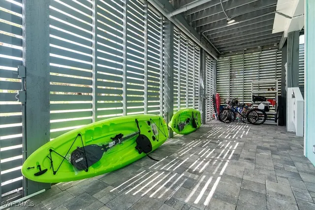 a view of swimming pool with seating area