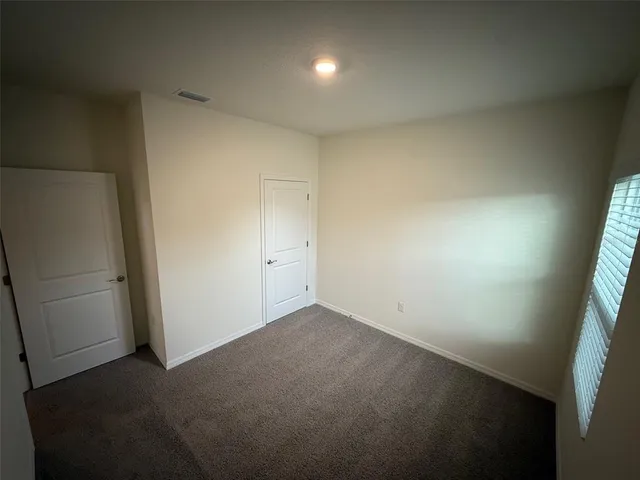 an empty room with an entryway