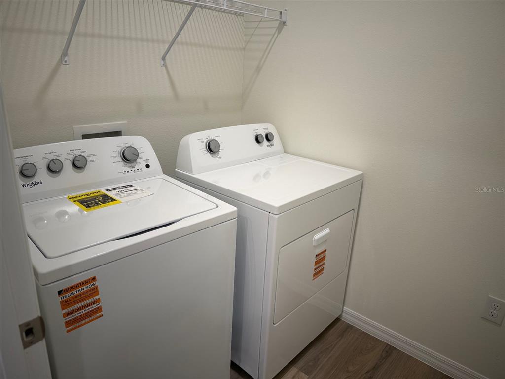 5314 Southwest 52nd Avenue Gainesville, FL 32608 - Photo 25 of 30 a utility room with dryer and washer
