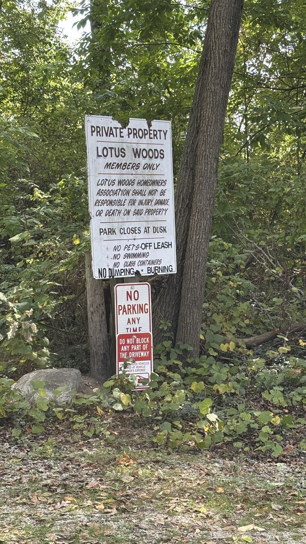 38408 North Primrose Path Spring Grove, IL 60081 - Photo 11 of 11 a sign on the side of a tree