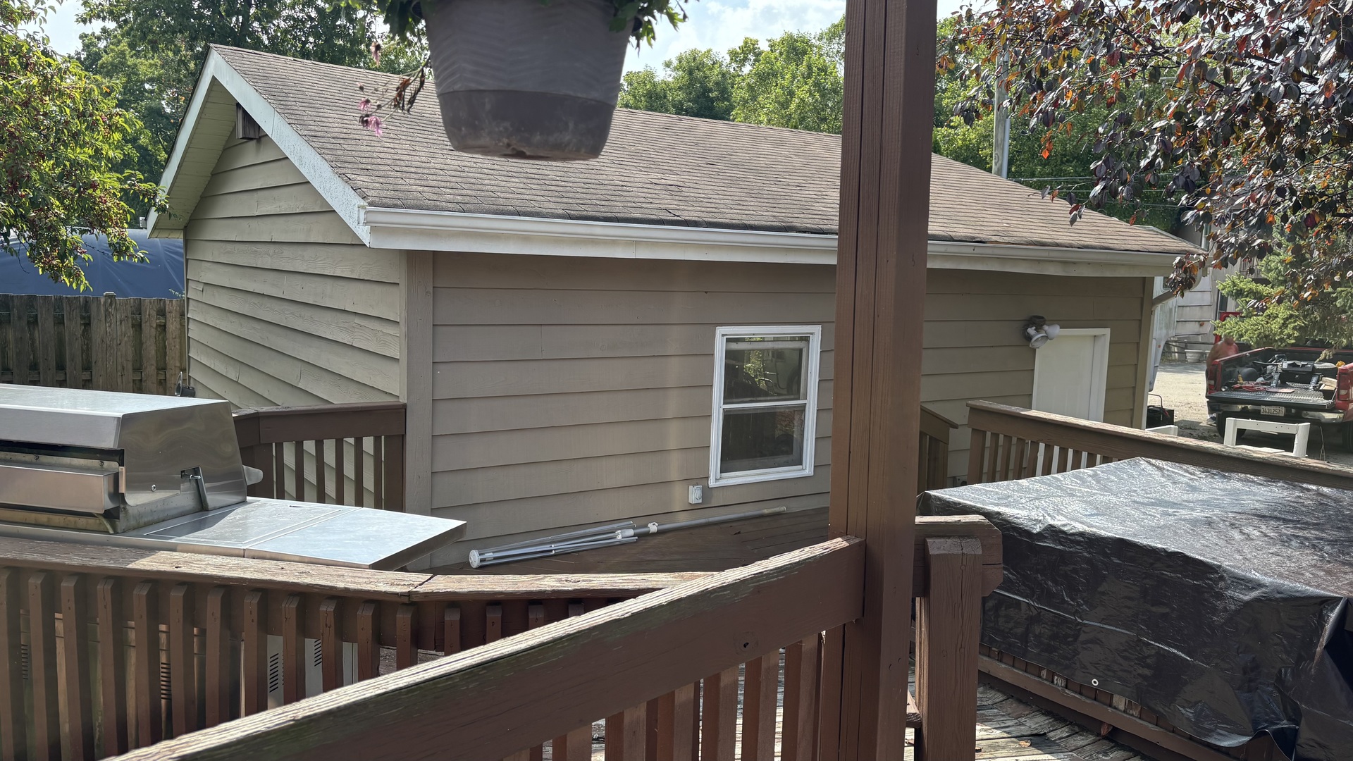 38408 North Primrose Path Spring Grove, IL 60081 - Photo 5 of 11 a view of a patio with table and chairs with wooden fence and floor
