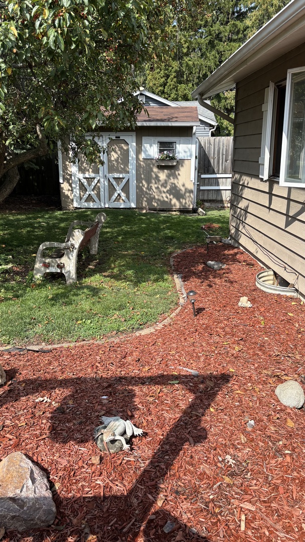 38408 North Primrose Path Spring Grove, IL 60081 - Photo 7 of 11 a view of a back yard of the house