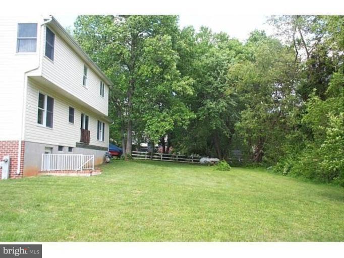 6511 Upland Road Fork, MD 21051 - Photo 2 of 23 a view of a house with a yard and sitting area