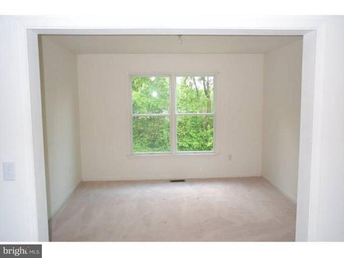 6511 Upland Road Fork, MD 21051 - Photo 14 of 23 a view of an empty room with a window