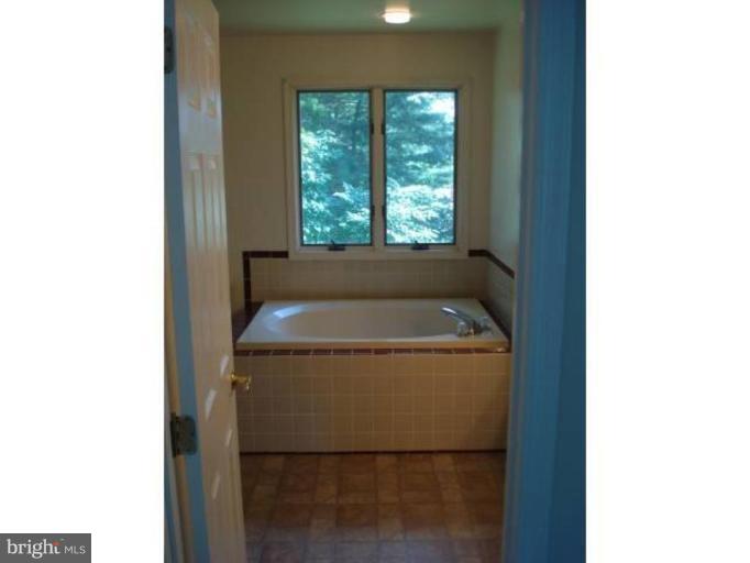 6511 Upland Road Fork, MD 21051 - Photo 16 of 23 a view of bathroom with bathtub