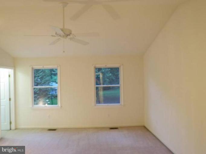 6511 Upland Road Fork, MD 21051 - Photo 17 of 23 an empty room with windows