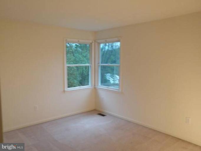 6511 Upland Road Fork, MD 21051 - Photo 18 of 23 an empty room with windows