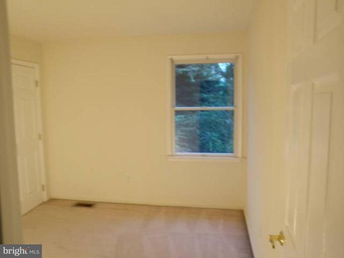 6511 Upland Road Fork, MD 21051 - Photo 19 of 23 an empty room with a window