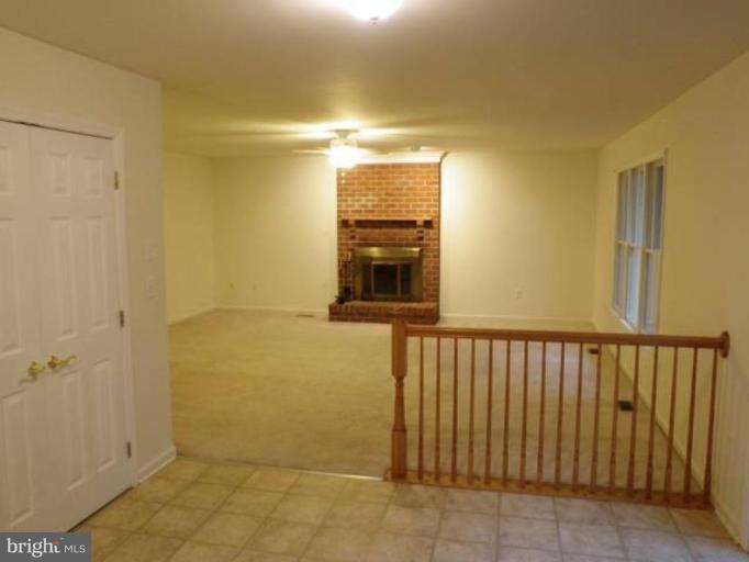 6511 Upland Road Fork, MD 21051 - Photo 3 of 23 a view of a hallway with a small space