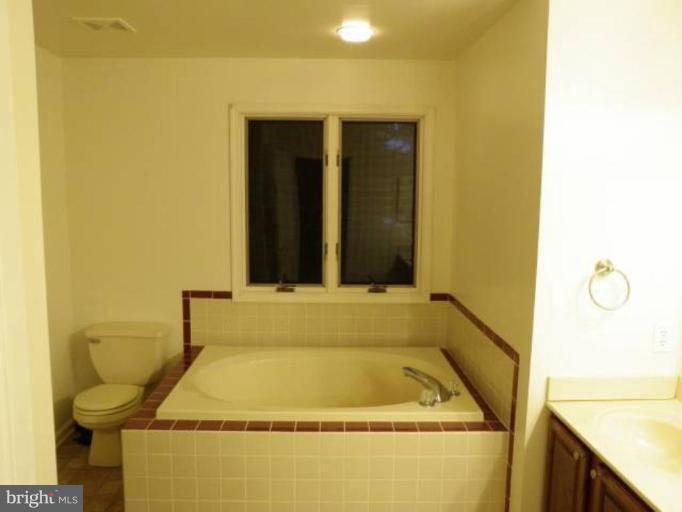 6511 Upland Road Fork, MD 21051 - Photo 21 of 23 a bathroom with a sink