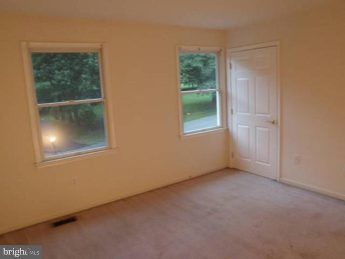 6511 Upland Road Fork, MD 21051 - Photo 23 of 23 an empty room with windows