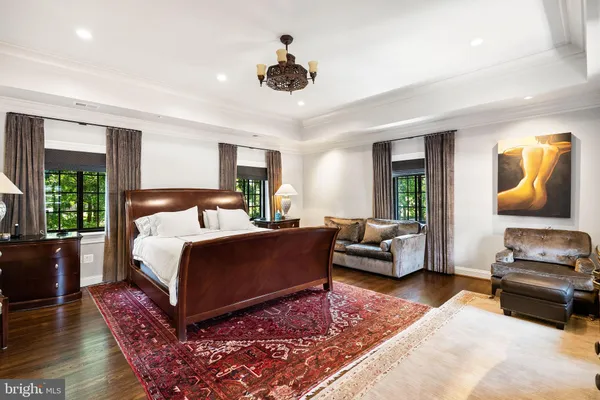 a spacious bathroom with a bathtub sink and toilet