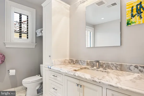 a view of a hallway with entryway door