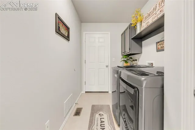 a kitchen with a stove and a refrigerator