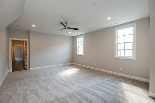 a view of a two chairs and table in the balcony
