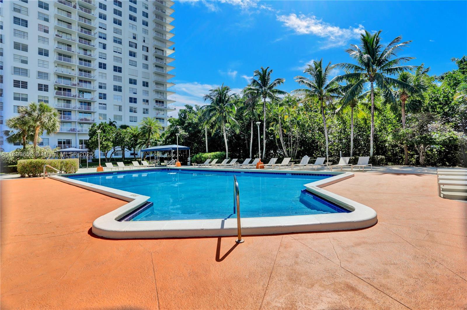 2851 Northeast 183rd Street, Unit 1017E Aventura, FL 33160 - Photo 35 of 46 a view of outdoor space swimming pool and seating