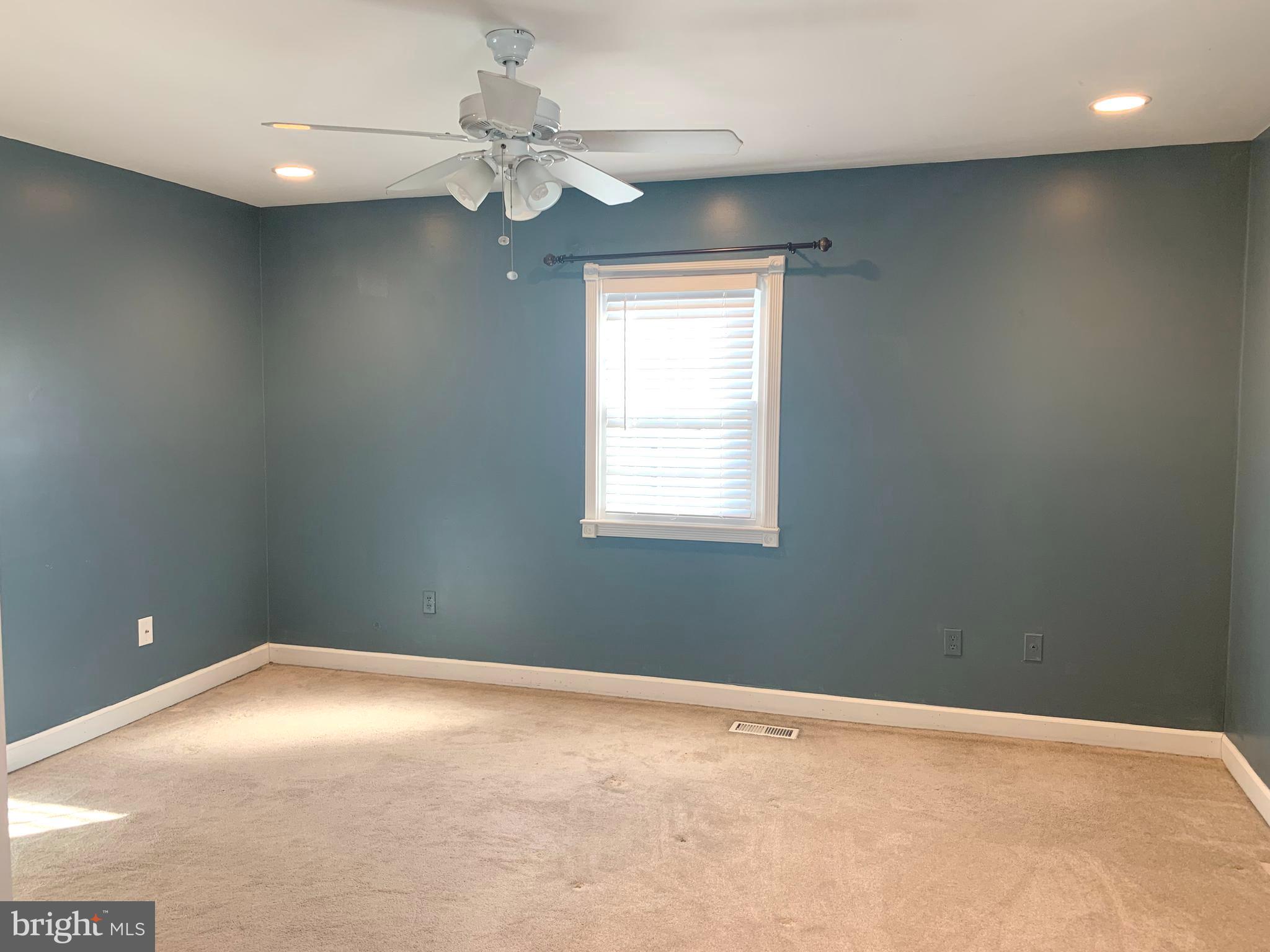 781 Powhatan Beach Road Pasadena, MD 21122 - Photo 11 of 24 a view of an empty room with a window