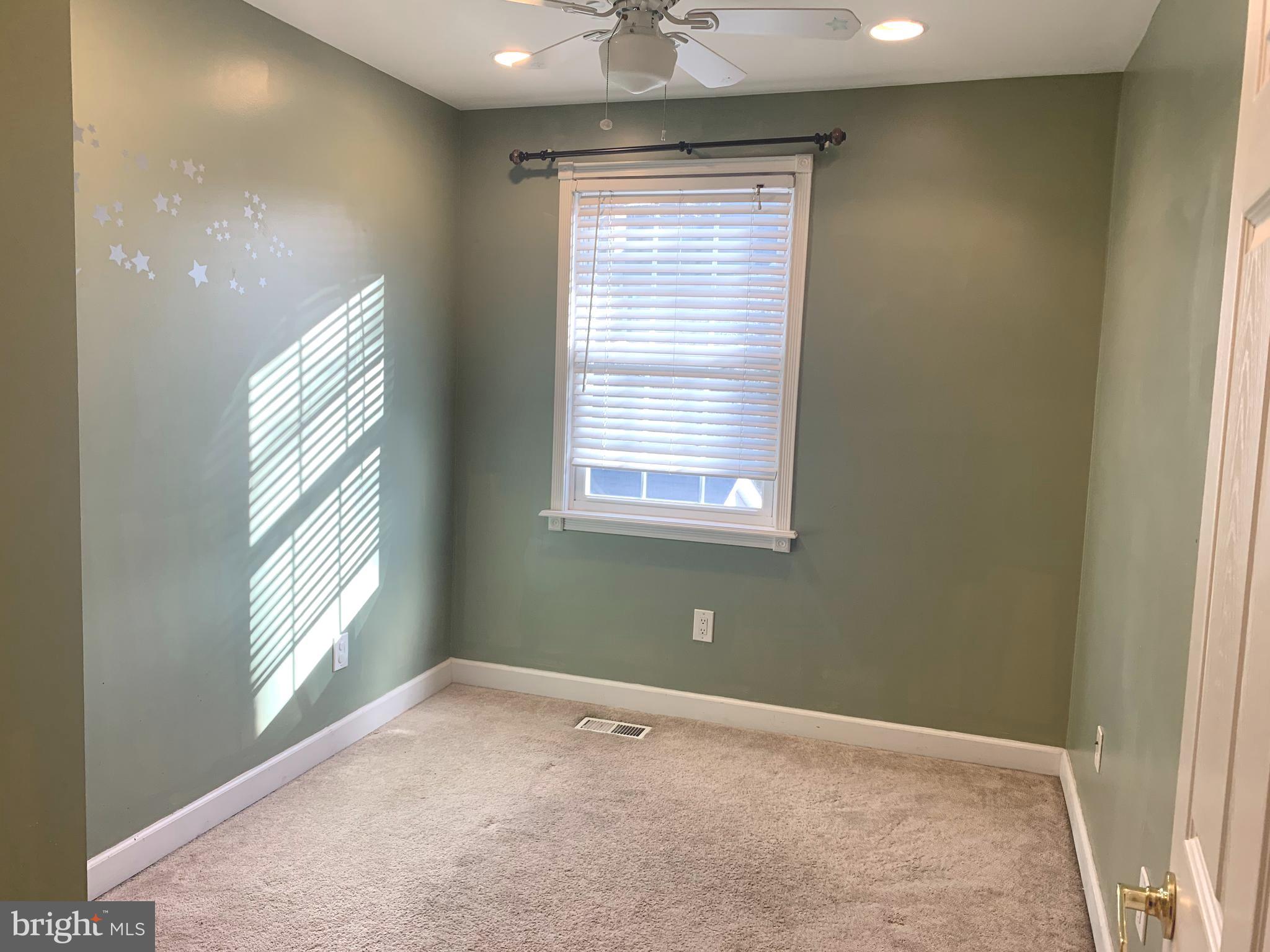 781 Powhatan Beach Road Pasadena, MD 21122 - Photo 15 of 24 an empty room with windows and closet