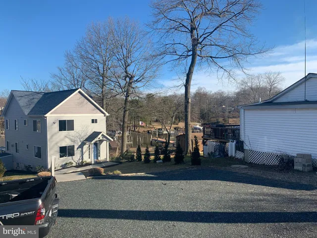 a car parked in front of a house