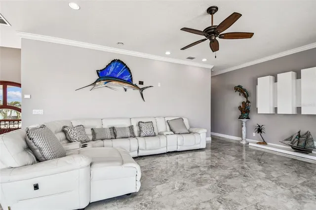 a bathroom with a granite countertop double vanity sink and two mirror