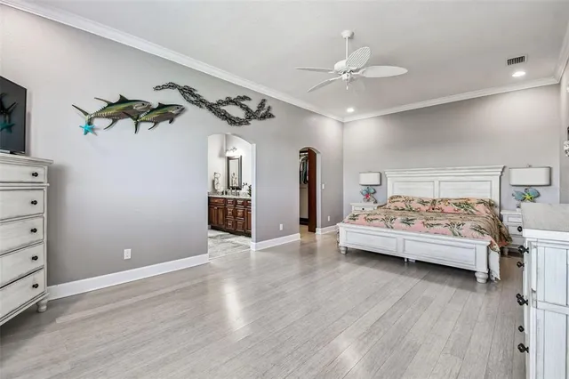 a view of a swimming pool with a lounge chairs