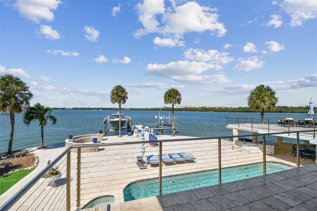 582 Johns Pass Avenue Madeira Beach, FL 33708 - Photo 5 of 100 a view of a terrace with chairs