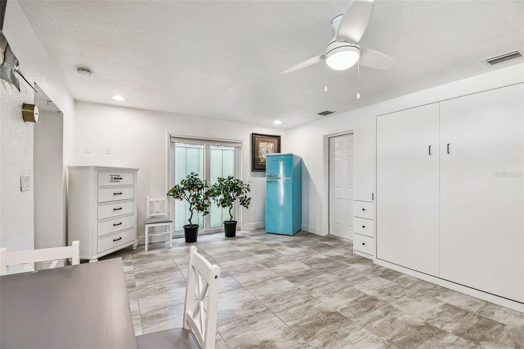 582 Johns Pass Avenue Madeira Beach, FL 33708 - Photo 82 of 100 a view of a bedroom with furniture and closet