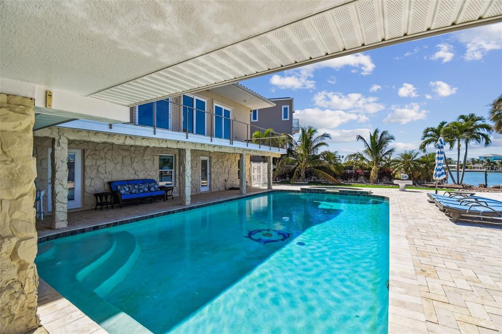 582 Johns Pass Avenue Madeira Beach, FL 33708 - Photo 88 of 100 a view of swimming pool with outdoor seating