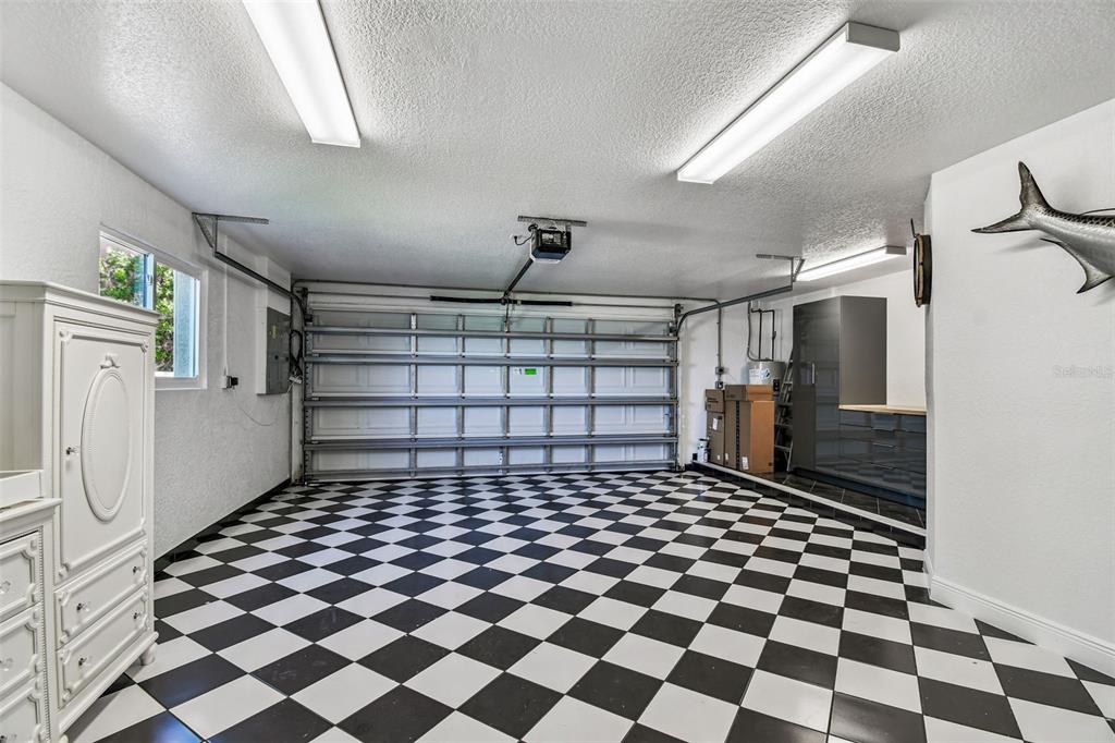 582 Johns Pass Avenue Madeira Beach, FL 33708 - Photo 96 of 100 a black and white checkered floor