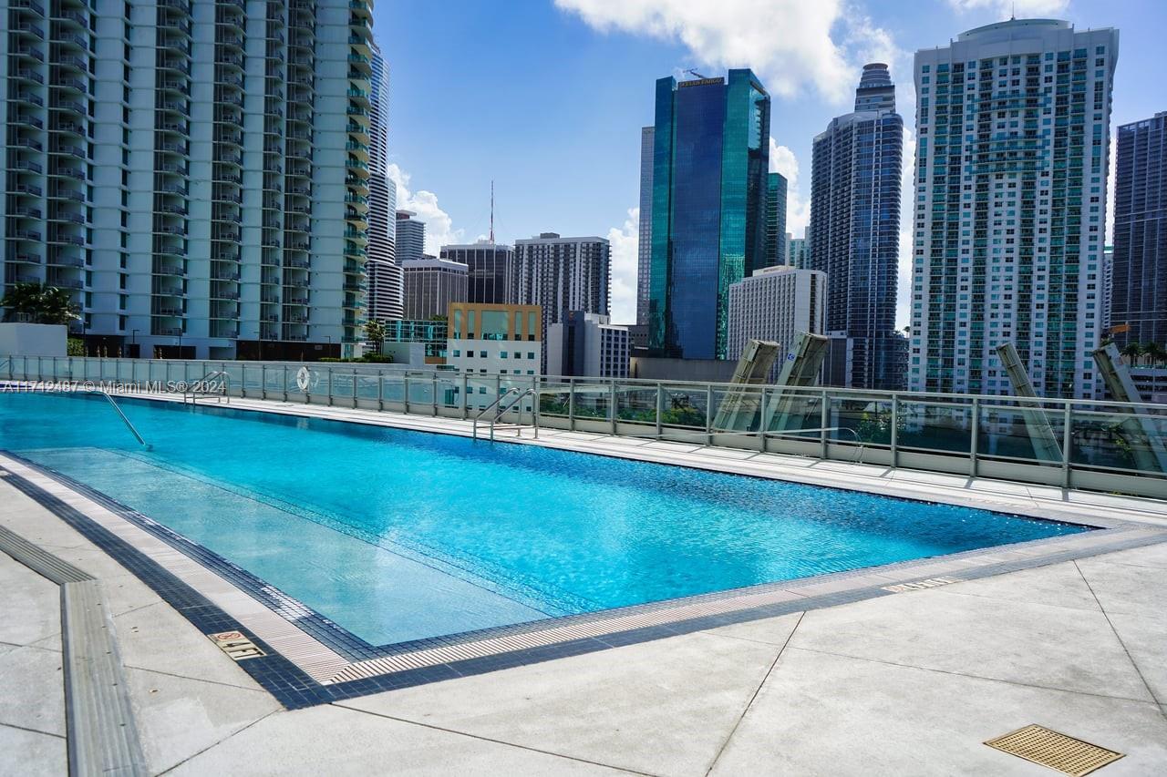 92 Southwest 3rd Street, Unit 4411 Miami, FL 33130 - Photo 4 of 17 a view of swimming pool with outdoor space