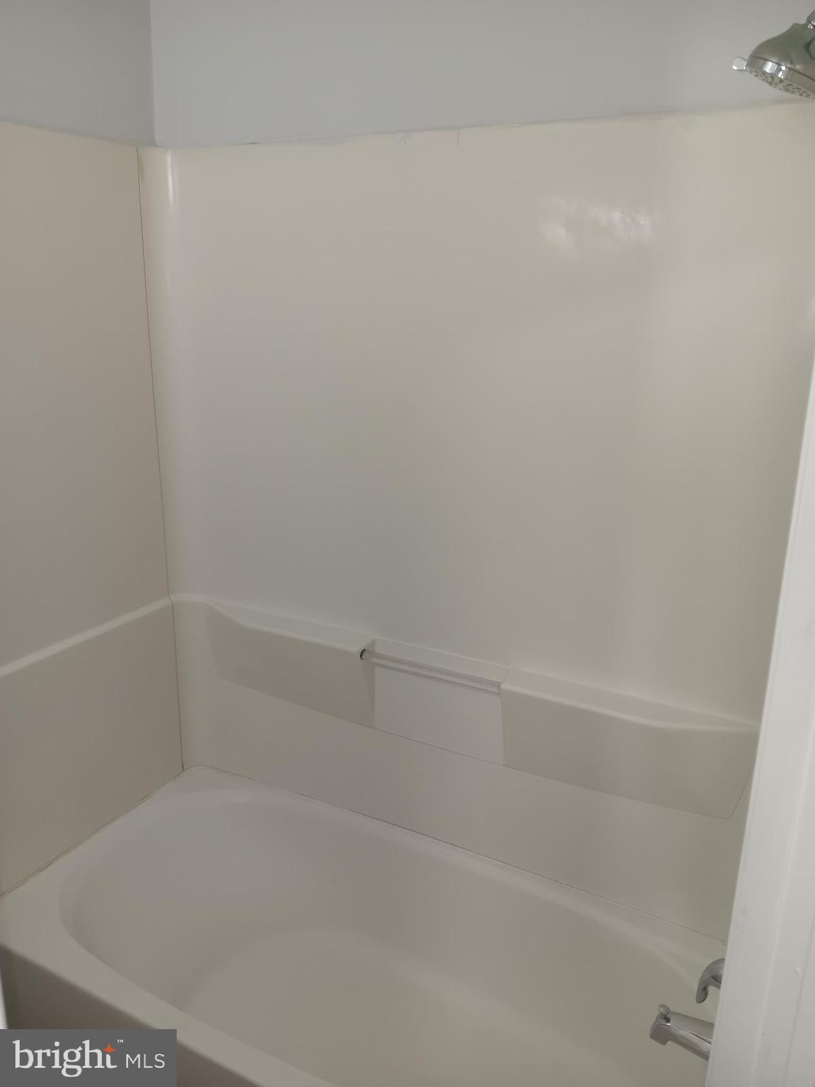 1012 Potter Street Chester, PA 19013 - Photo 15 of 19 a close up of a bathtub