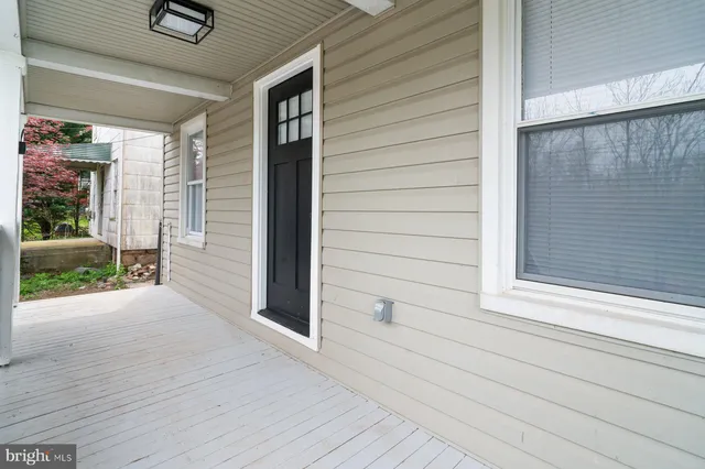 a view of front door and porch