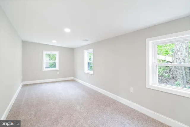 an empty room with windows