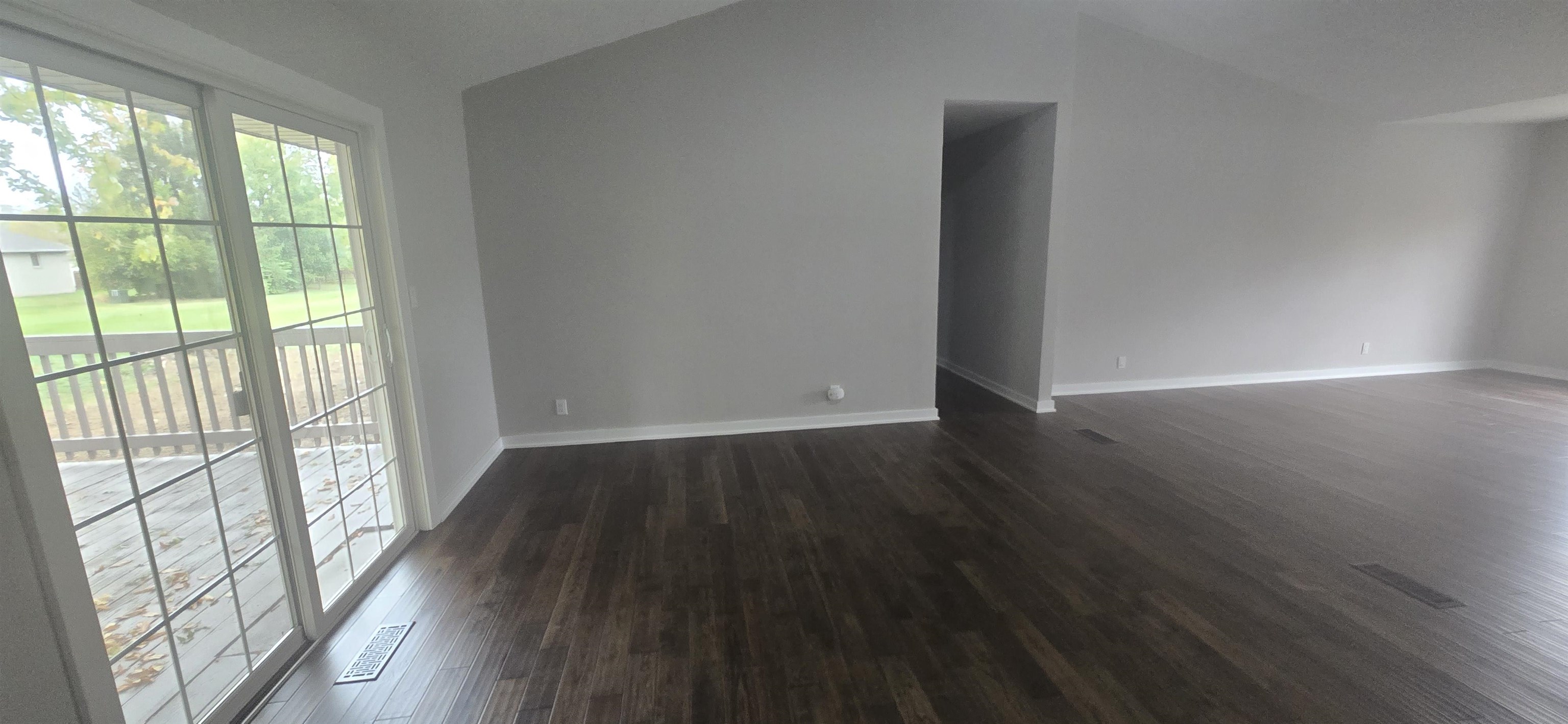3606 Springwheat Street Rockford, IL 61114 - Photo 16 of 41 wooden floor in an empty room with a window