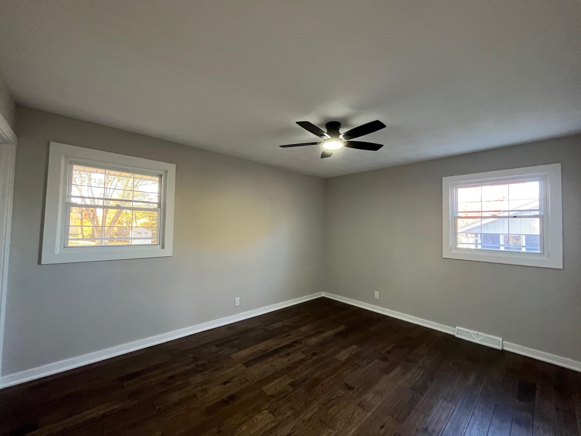 3606 Springwheat Street Rockford, IL 61114 - Photo 19 of 41 a view of a room that has wooden floor and a window
