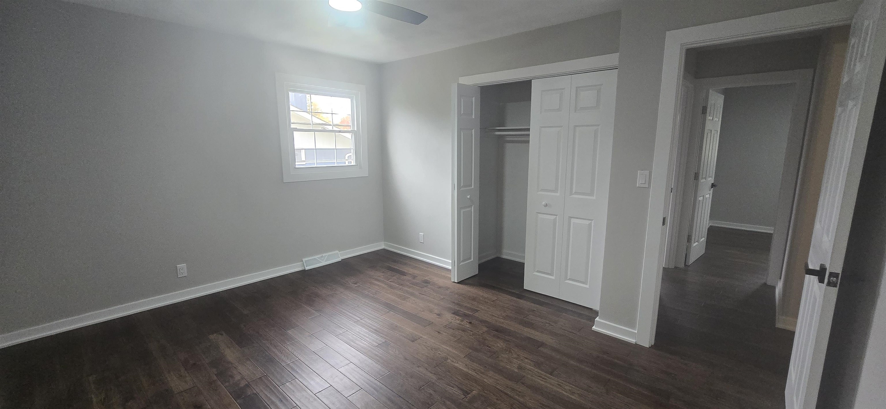3606 Springwheat Street Rockford, IL 61114 - Photo 22 of 41 an empty room with wooden floor and closet