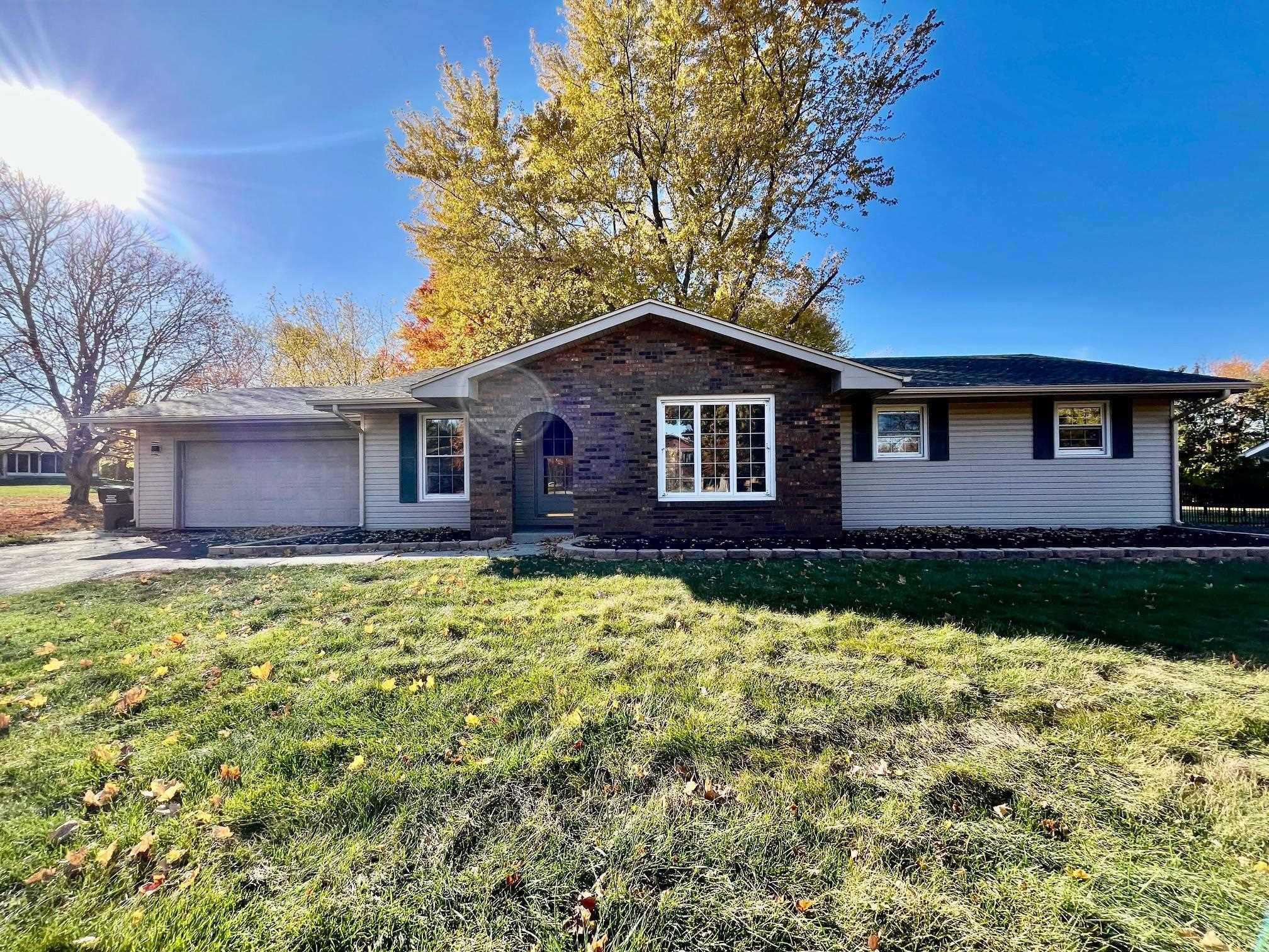 3606 Springwheat Street Rockford, IL 61114 - Photo 3 of 41 a front view of a house with a yard