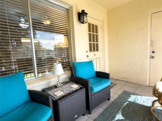 a view of a living room and a window