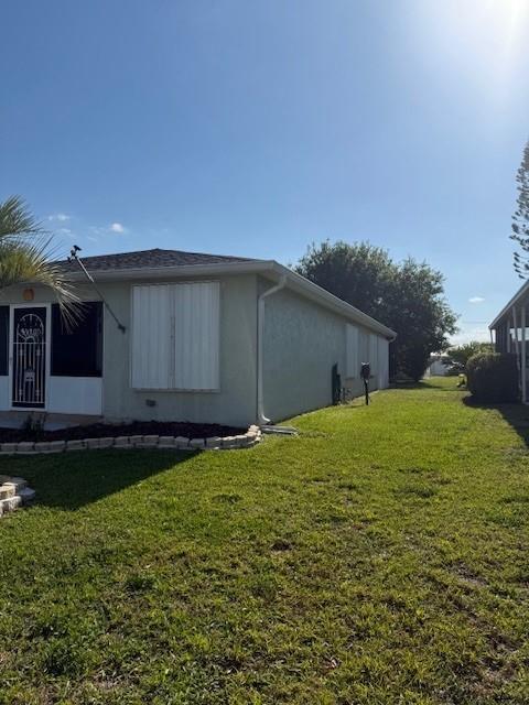 Undisclosed Address Fort Pierce, FL 34951 - Photo 3 of 10 a backyard of a house