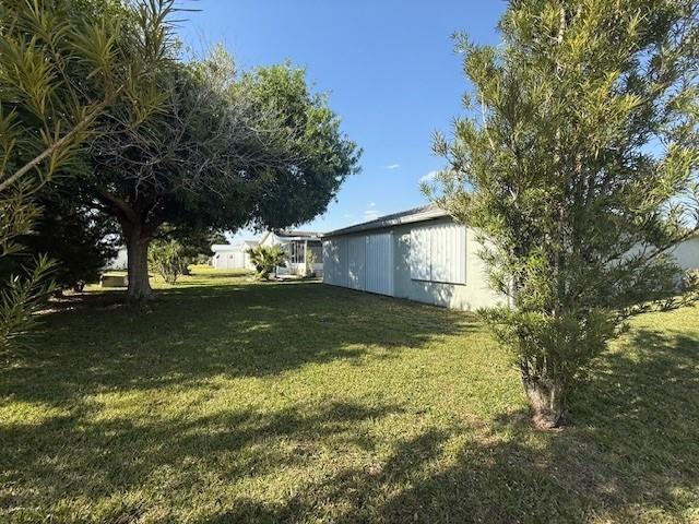 Undisclosed Address Fort Pierce, FL 34951 - Photo 6 of 10 a view of yard with green space and trees